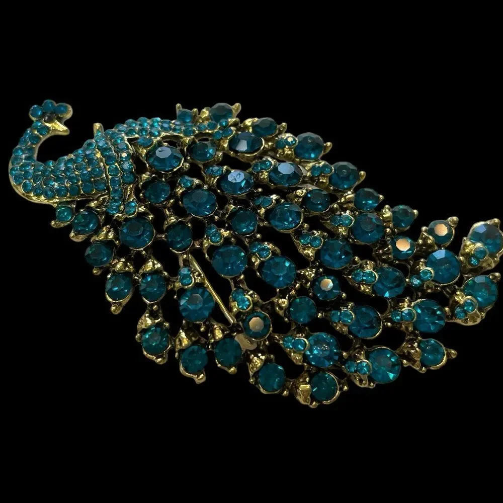 RHINESTONE PEACOCK BROOCH‎